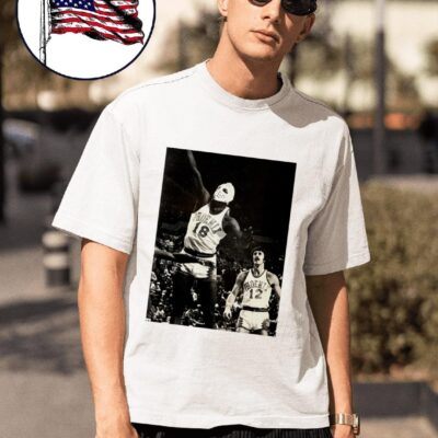 Phoenix Suns Curtis Perry 18 wearing a hockey mask and Pat Riley trailing photo shirt