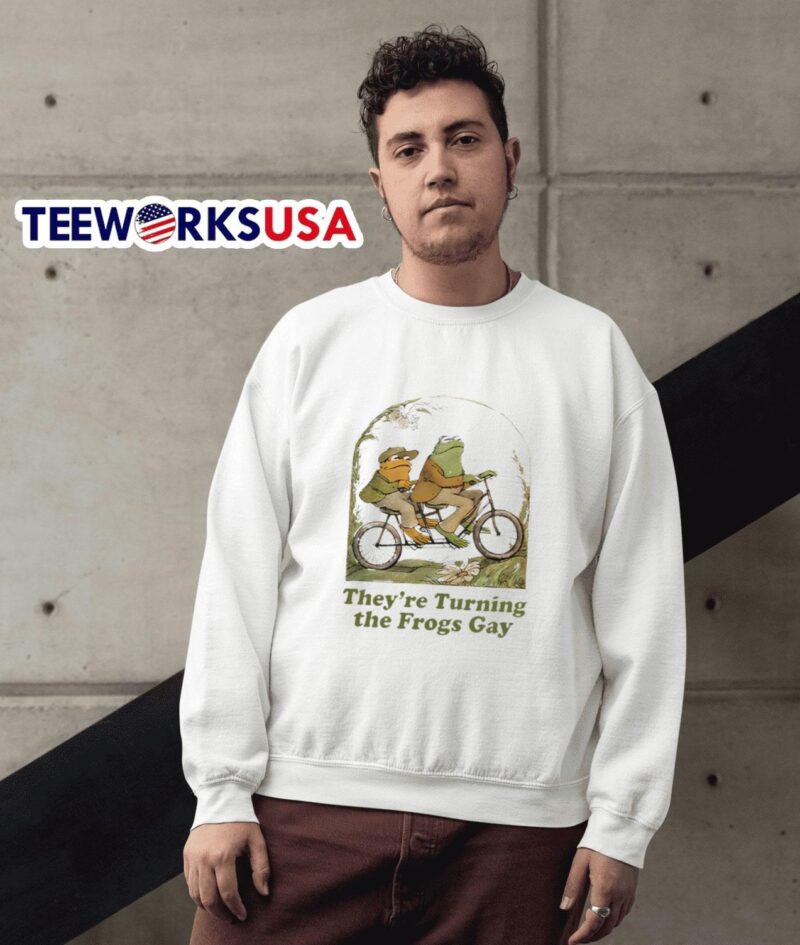 They’re turning the frogs gay cartoon sweater